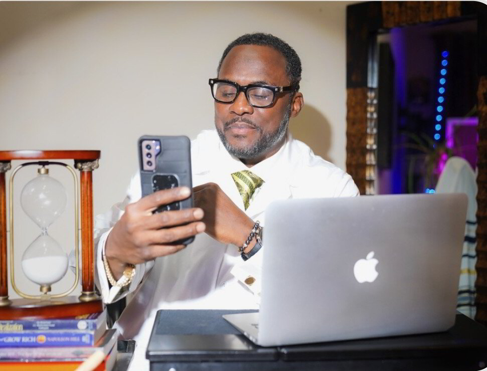 Kendrick B. Davis, Sr. at his desk preparing for a coaching session